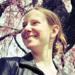 Heather under a pink flowered tree