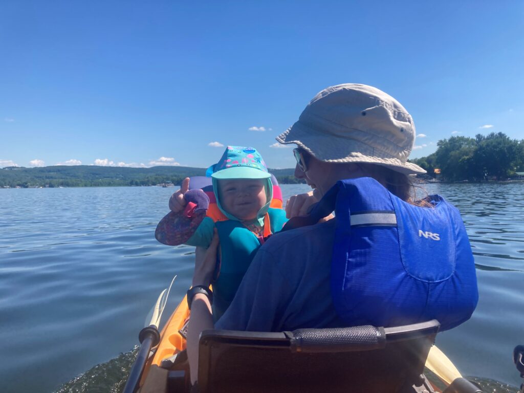 Kelli Hoffman in boat with daughter