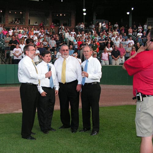 Tom singing the national anthem