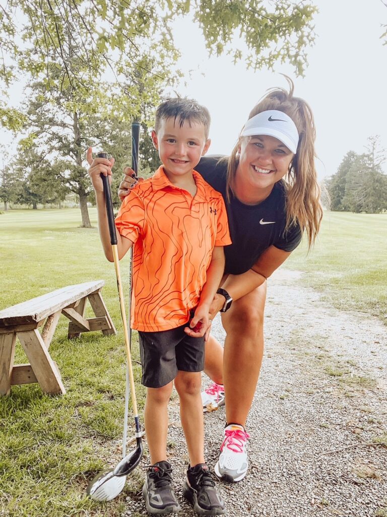 brittany and son golfing